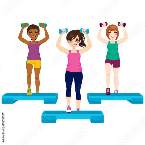 Three beautiful active women doing aerobic exercise with dumbbell and steps