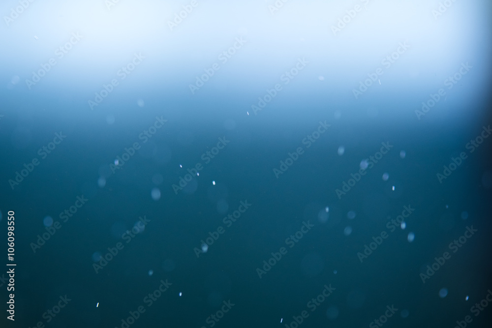 blured floating bubble on blue background