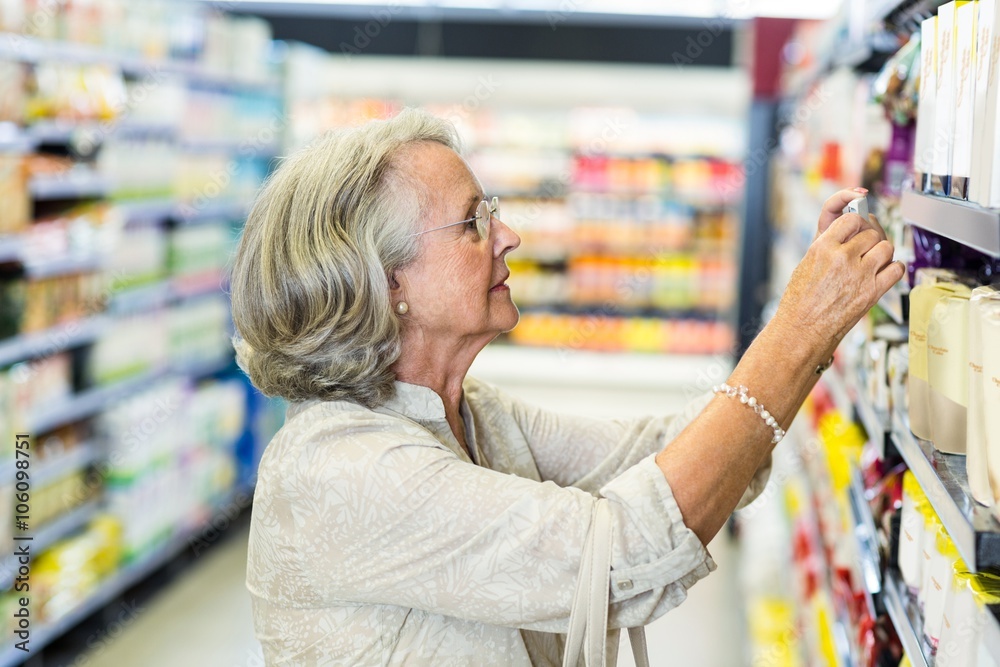 Senior woman buying food