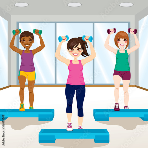 Three beautiful young girls doing aerobic exercises at gym