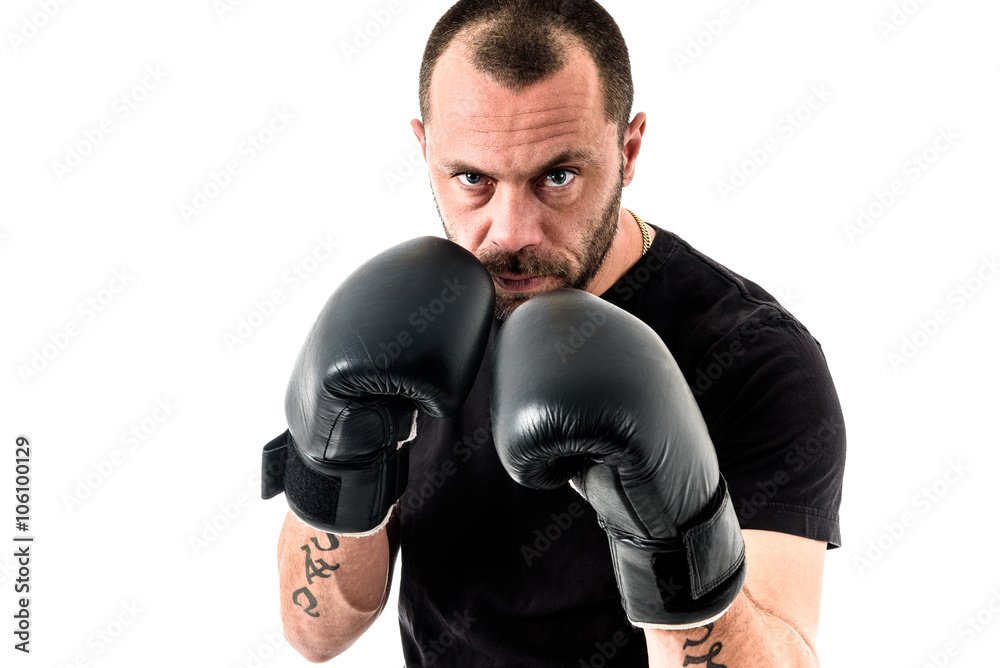 Portrait of male athlete boxer man looking aggressive with boxin