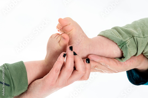 Baby Twins Feet in parents hands