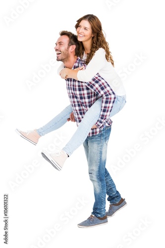 Man giving piggyback ride to woman