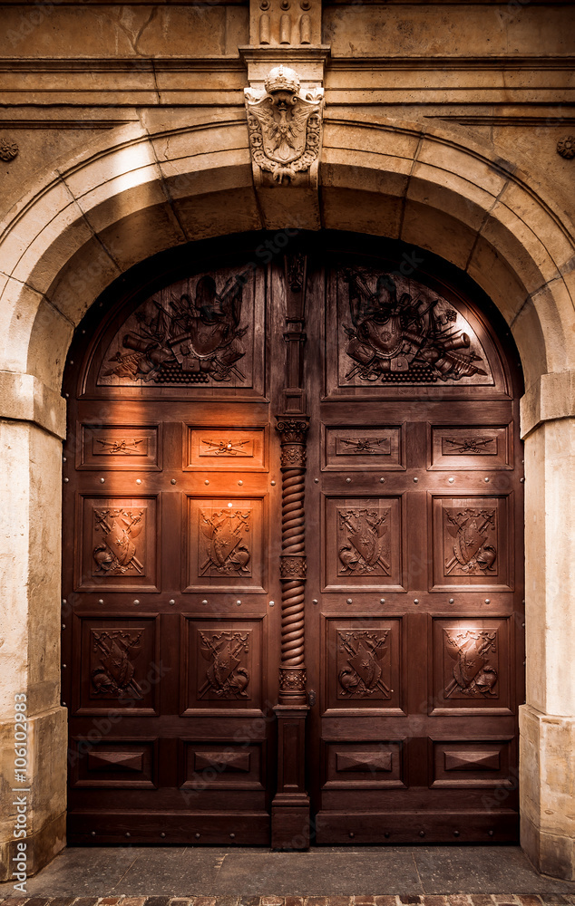 Old buildings and structures. Europe Attractions. Sights. Urban landscape. Carved wooden gate