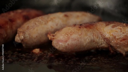 Frying, Roasting sausages sausages in a pan
