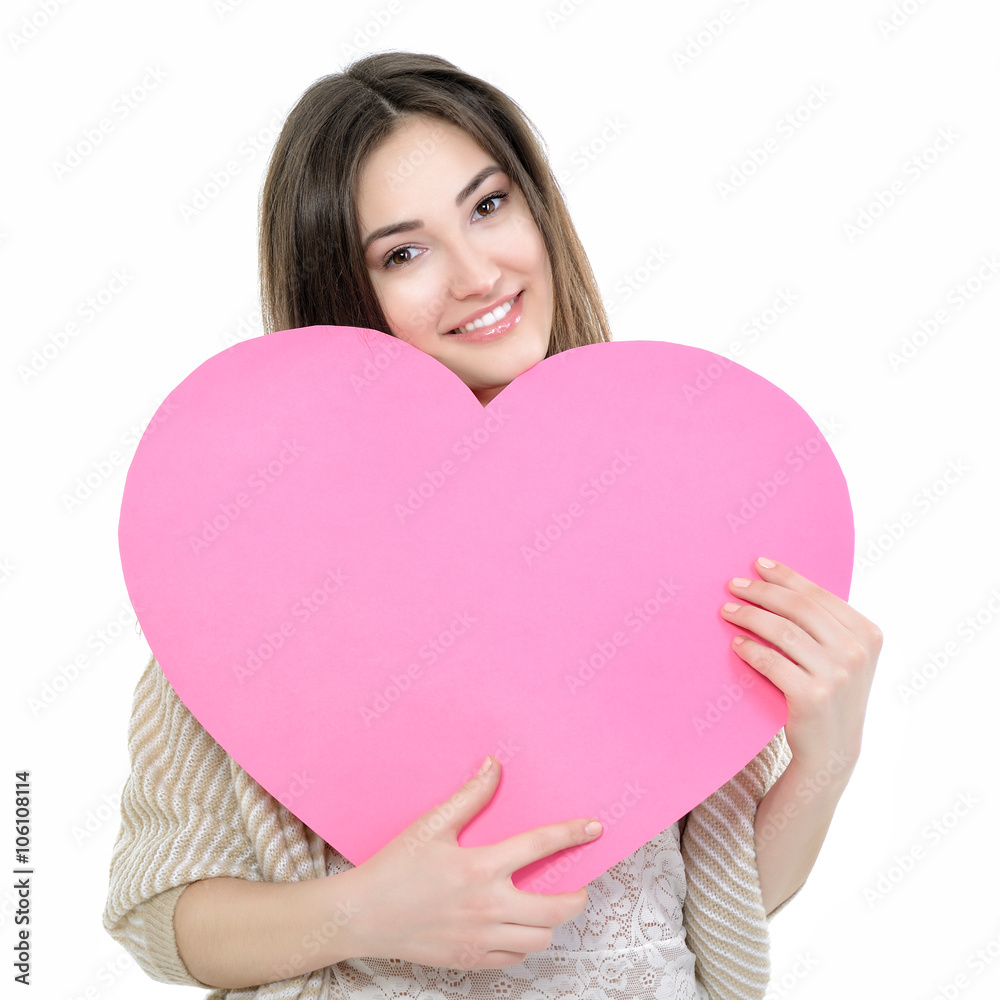 Portrait of attractive happy smiling teen girl with pink heart, Portrait of attractive happy smiling teen girl with pink heart,