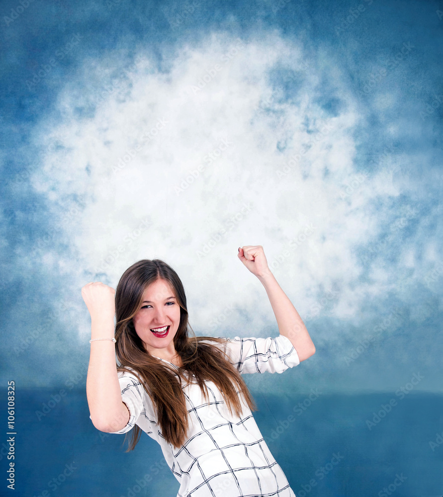 Jubelnde, junge Frau StockFoto Adobe Stock