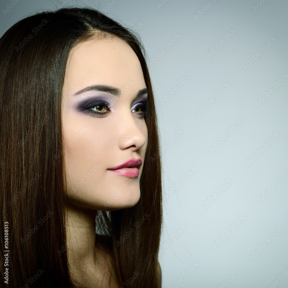 Fototapeta premium Portrait of very pretty young woman. Image toned.