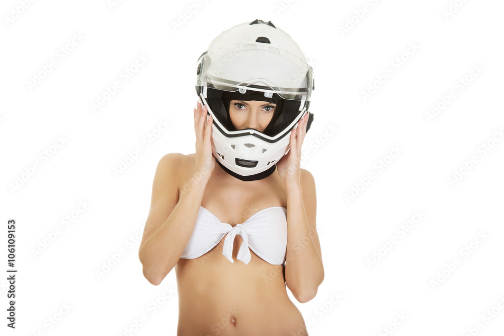 Sexy woman with motorcycle helmet.