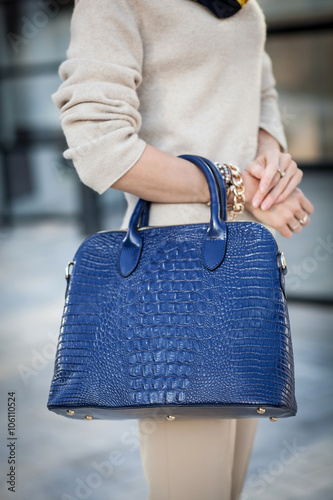 woman with nice blue handbag