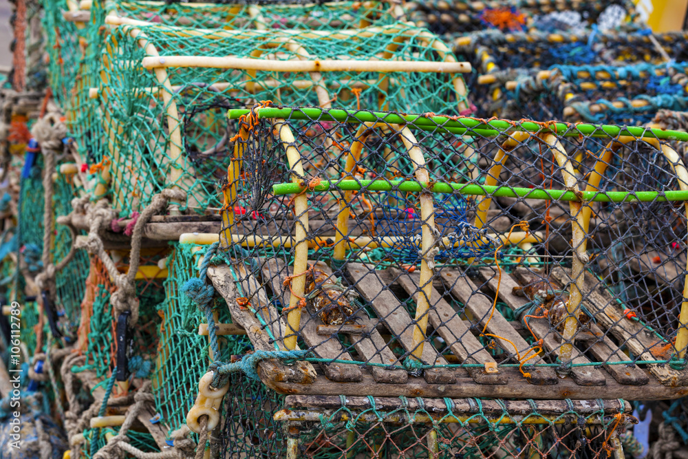 Mesh net shellfish traps at sea port Mesh net shellfish traps at sea port