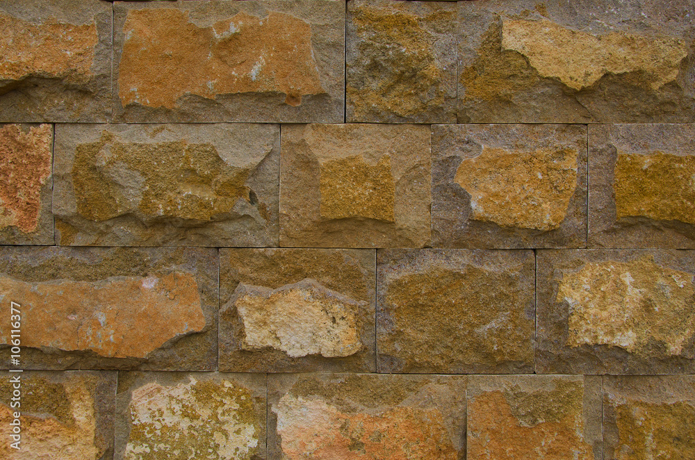 Fototapeta premium Wall of decorative brick. Stone texture background.