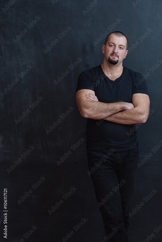 Handsome men doing different expressions on chalkboard