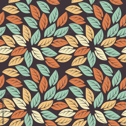 Elegant seamless pattern with colorful leaves on purple backgrou