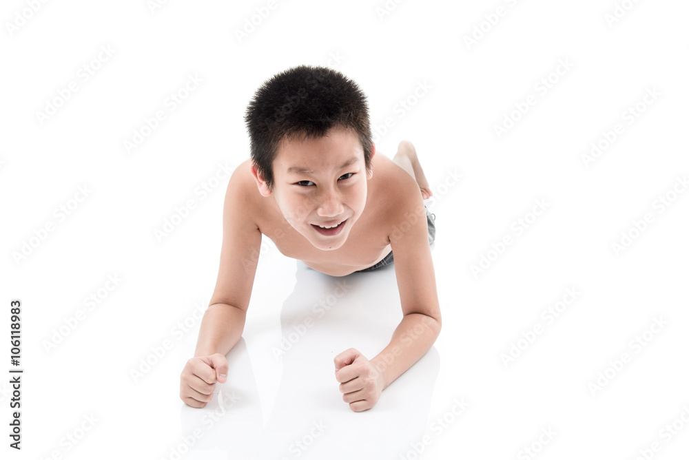 Asian boy doing plank exercise on white background. Asian boy doing plank exercise on white background.