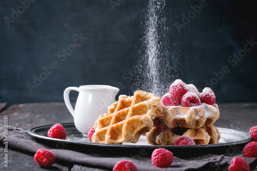 Belgian waffles with raspberries photo