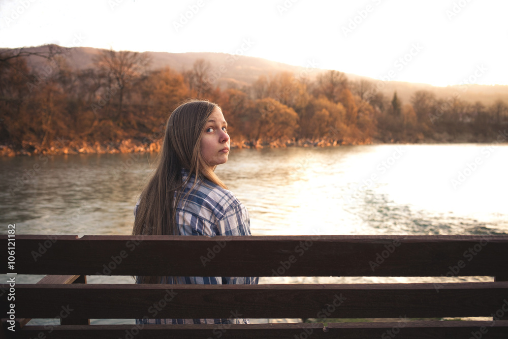 Thinking Girl on Bench at River