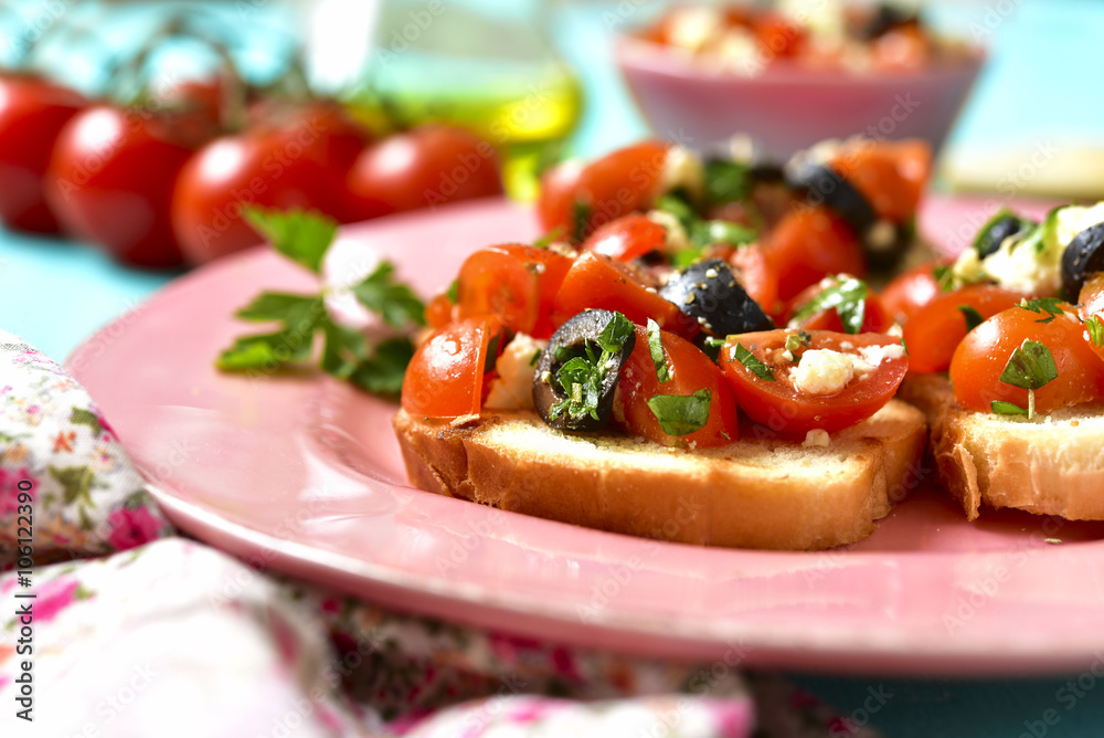 Crostini with tomatoes,feta and olives.