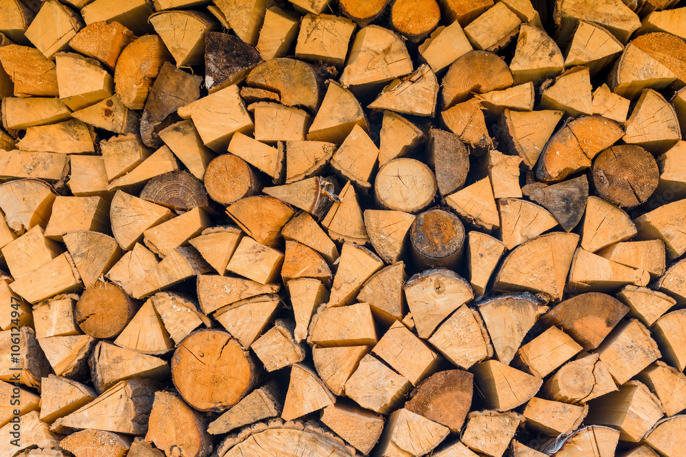 background - woodlogs cleaved for the stove close-up background - woodlogs cleaved for the stove close-up