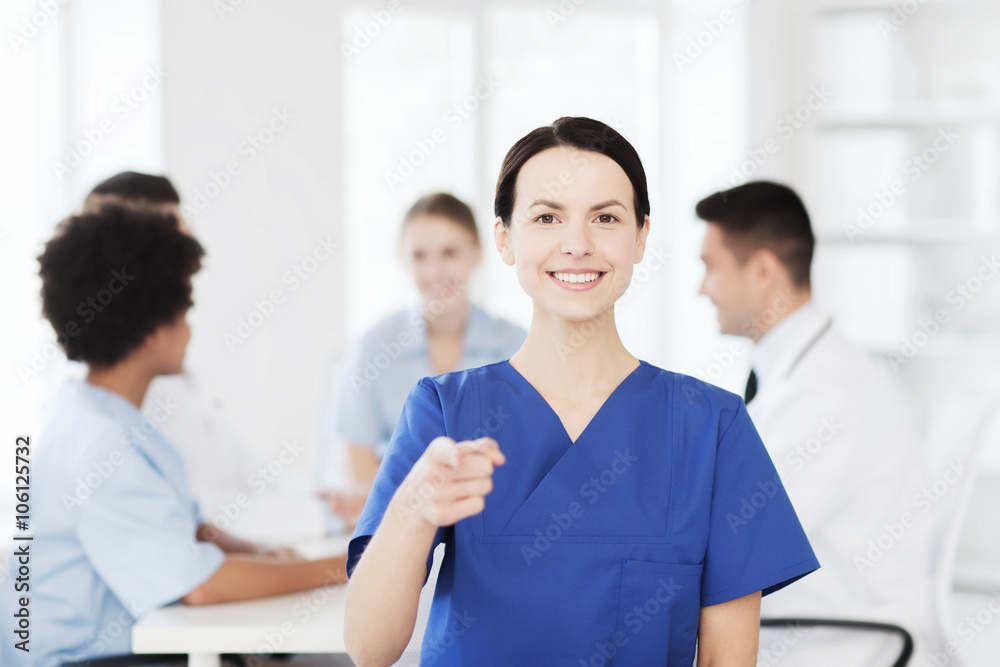 happy doctor over group of medics at hospital happy doctor over group of medics at hospital