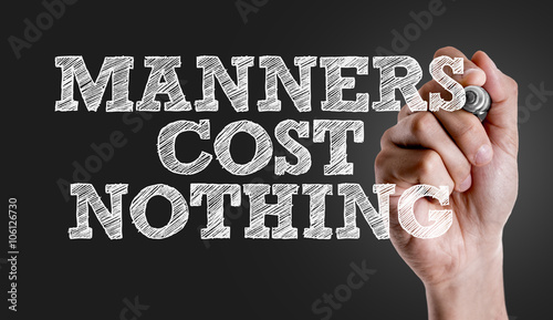 Canvas Print Hand writing the text: Manners Cost Nothing