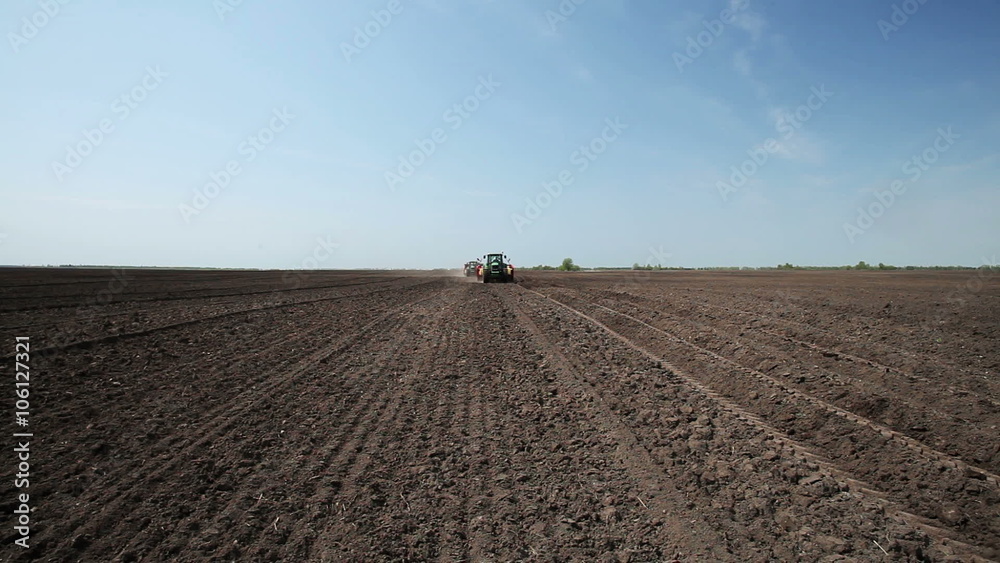 Potato tubers planting by using modern agricultural machinery Potato tubers planting by using modern agricultural machinery