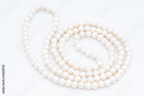 Pearls on the white background