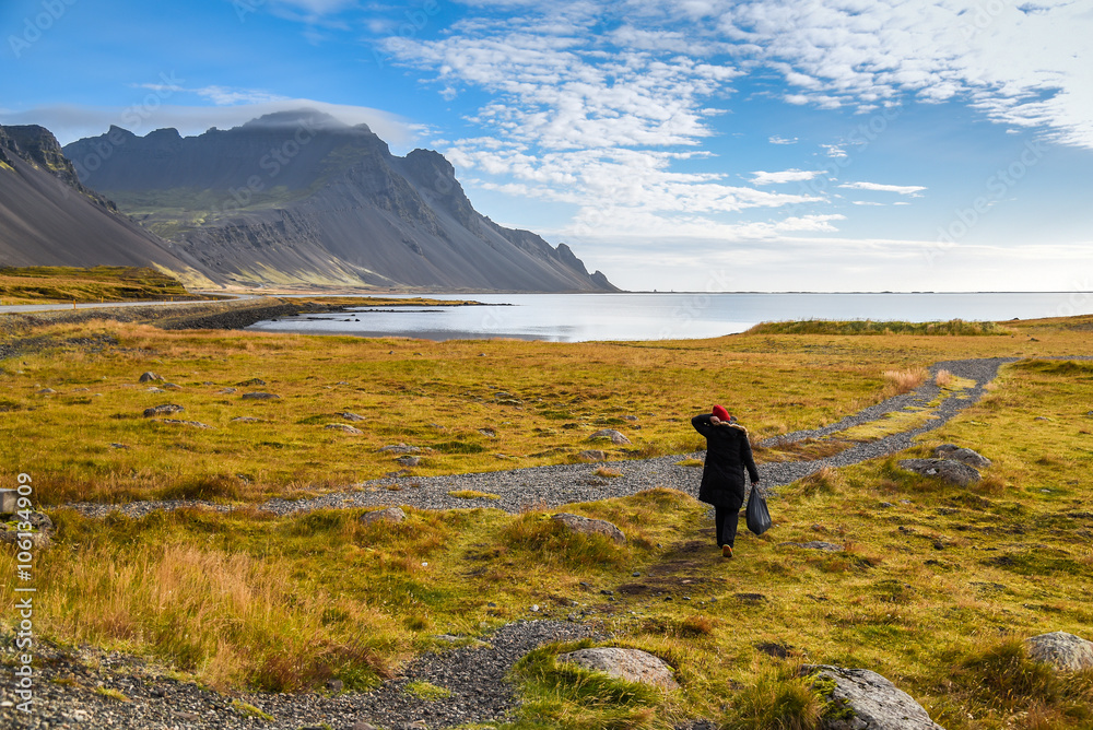 Fototapeta premium Woman traveler walk among beautiful landscape