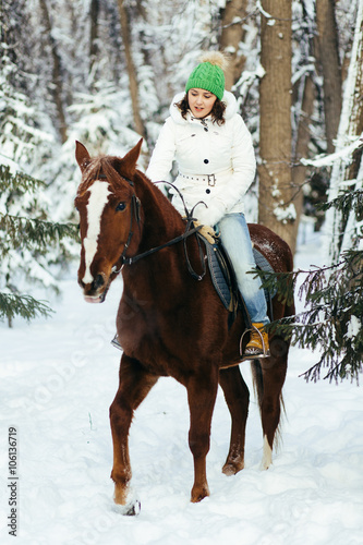 beautiful girl and horse in winter © Rustam Shigapov