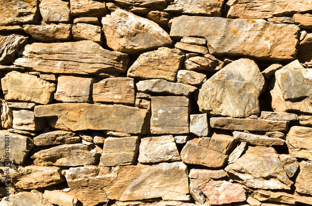 Fototapeta premium Old stone wall closeup