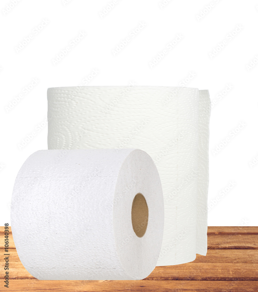 Fototapeta premium rolls of toilet paper on table isolated on white
