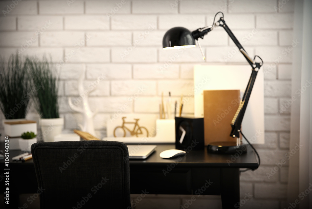 Workplace with laptop on table at home Workplace with laptop on table at home