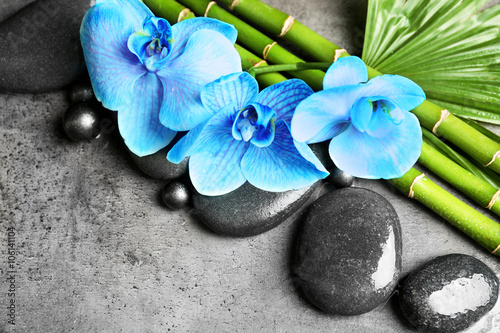 Fototapeta Naklejka Na Ścianę i Meble -  Beautiful spa composition with blue orchid, bamboo and stones