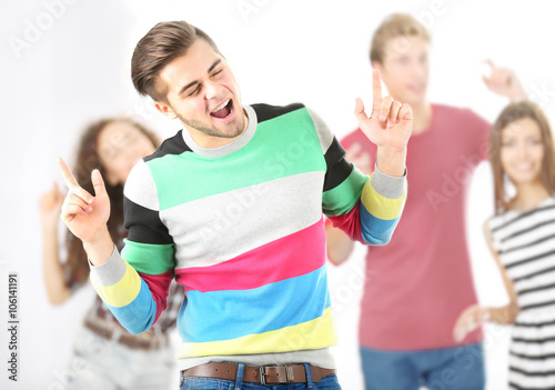 Teenager boy dancing with h...