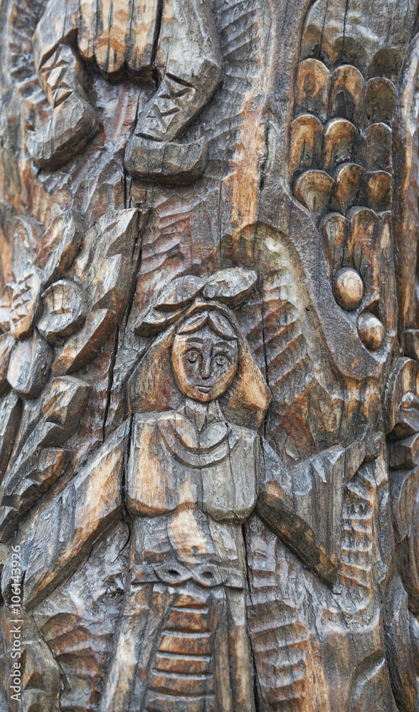 VARNA, BULGARIA, 27.02.2016: Ornamental Wood Carving with the image of Bulgarian folklore