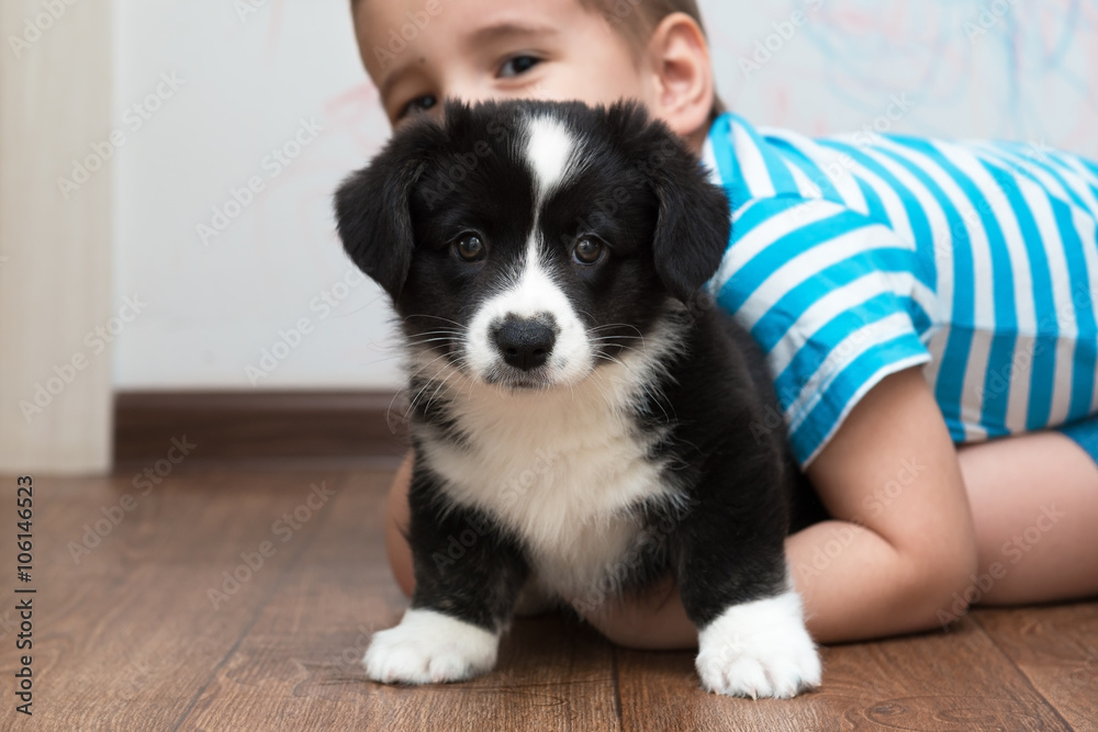 Portrait of a boy with a dog