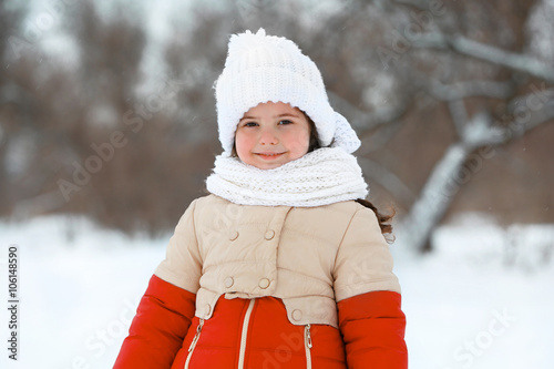 Little girl with winter clo...