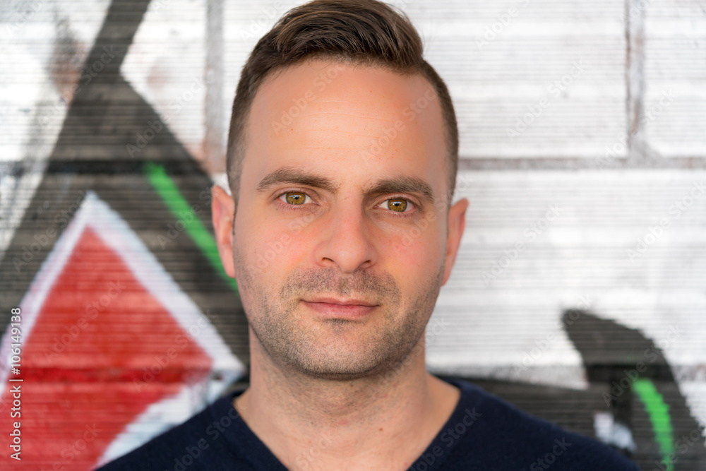 Portrait of short haired man looking at camera Portrait of short haired man looking at camera