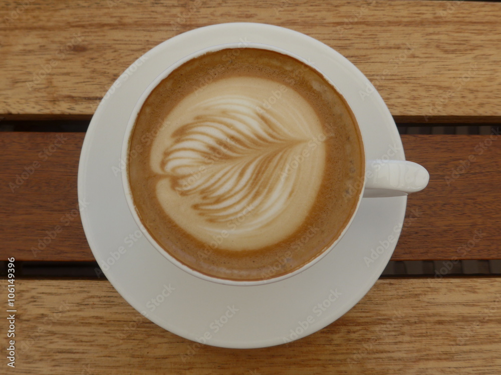 Coffee cup on a wooden table Coffee cup on a wooden table
