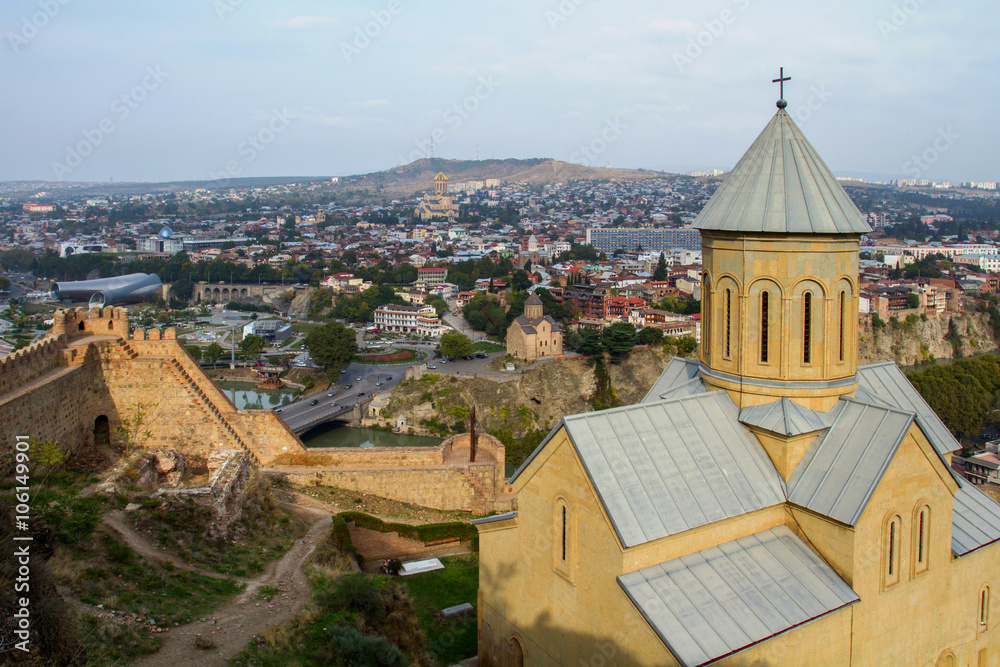 St. Nicholas Church in the fortress Narikala, panoramic city views of St. George's Bridge of Peace and Sameba, Tbilisi.