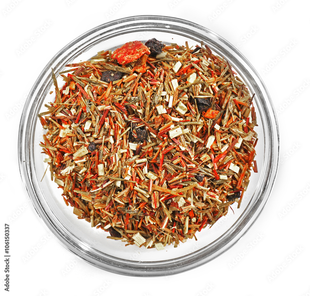 Rooibos tea in bowl, isolated on white Rooibos tea in bowl, isolated on white