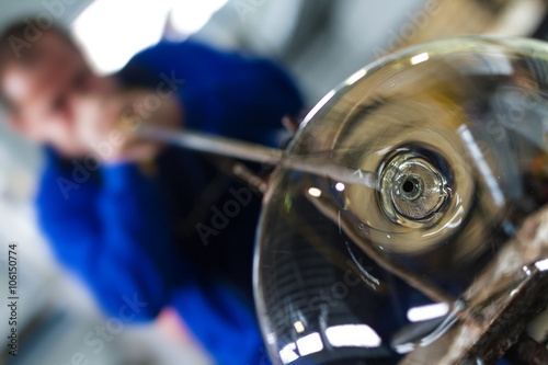 Glass crafting worker make glass souvenir