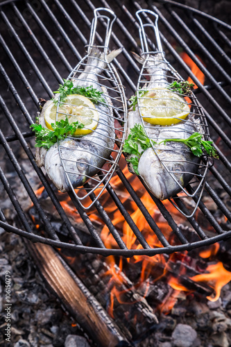 Tasty fish with herbs and l...