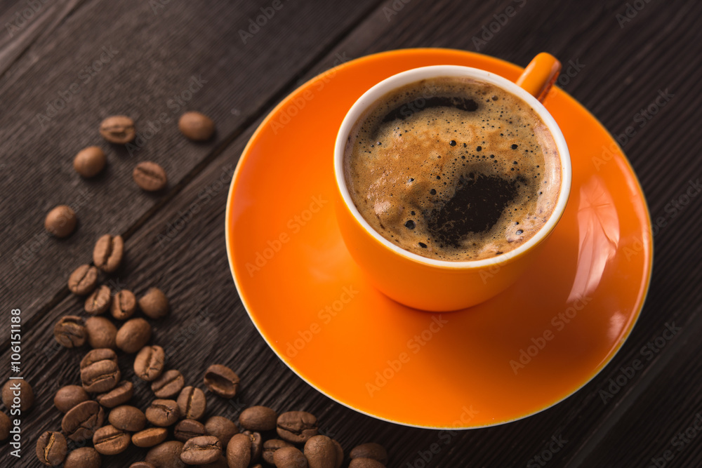 Orange cup of coffee Orange cup of coffee
