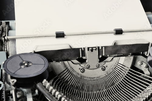 Old typewriter with paper, close up