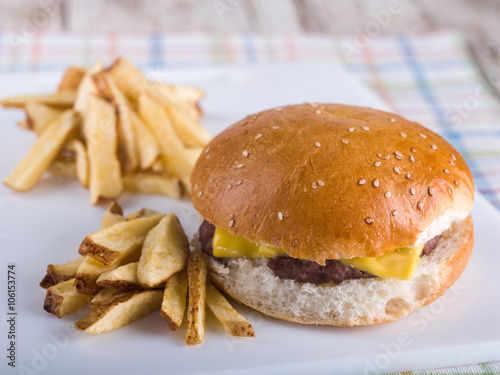 Cheeseburger and french fries photo