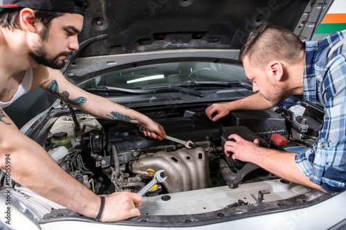 Workers at service station