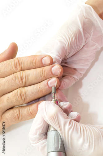 the process of the male manicure in a beauty salon