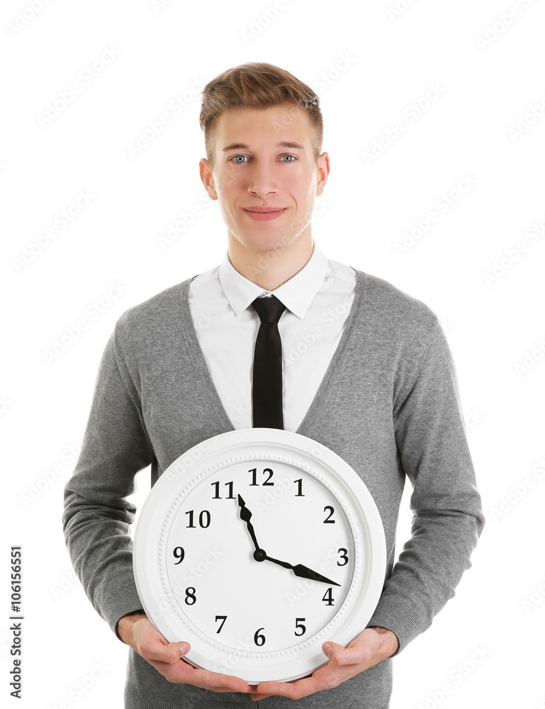 Handsome young man holding clock, isolated on white Handsome young man holding clock, isolated on white