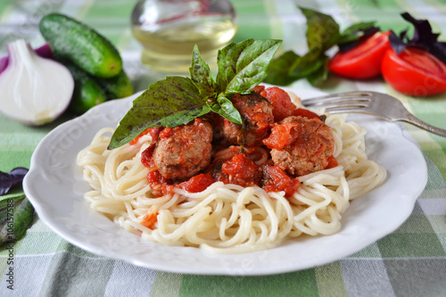 Spaghetti with tomato sauce and meatballs